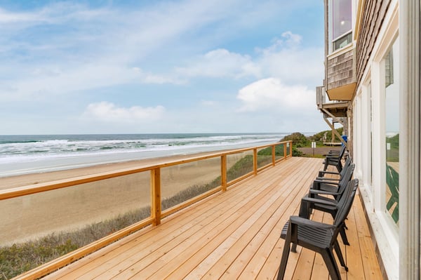 Step onto your private deck and take in the breathtaking oceanfront view—waves rolling in, fresh sea breeze, and endless horizon just steps from your door.